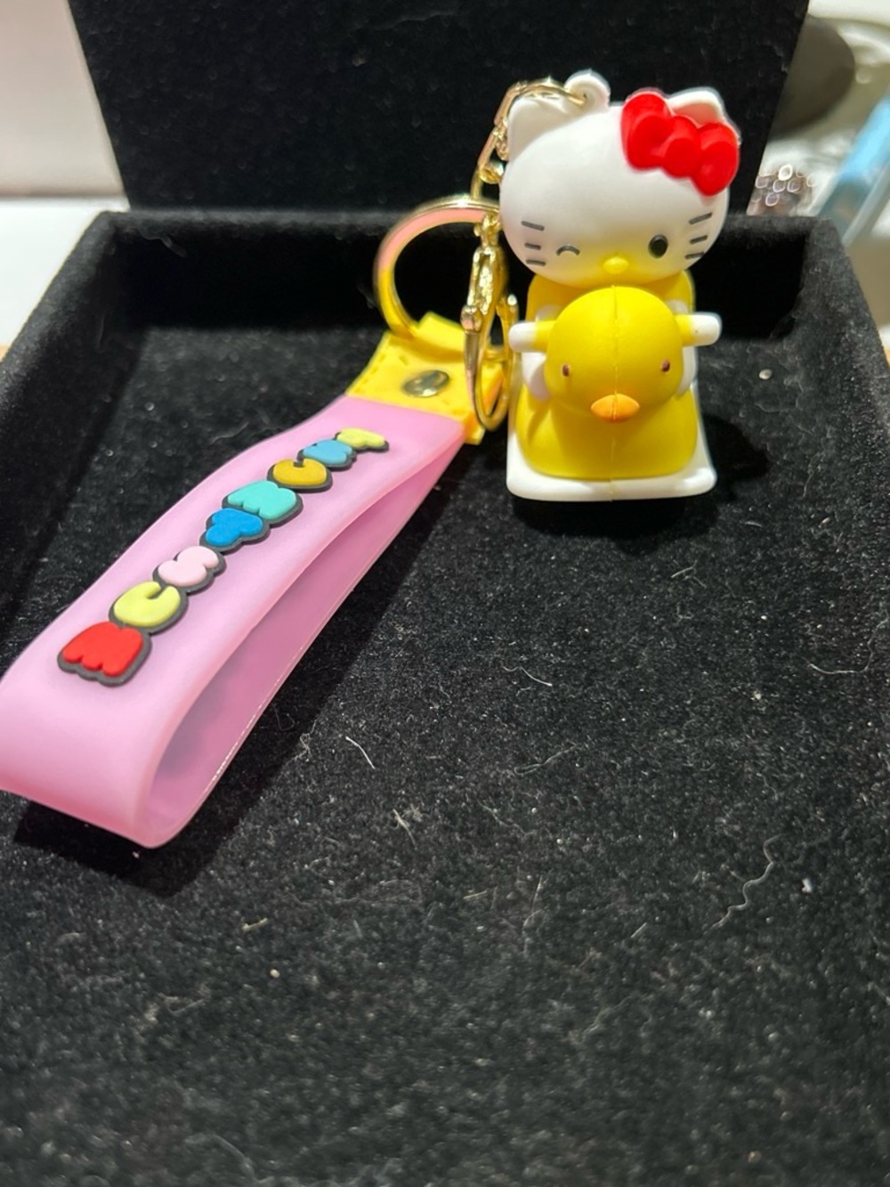Pink Silicone Strap Keychain with White Cat and Yellow Duck Charm
